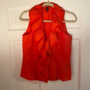 Sleeveless ruffled button up top